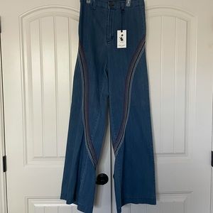 Angry Rabbit flare jeans with rainbow embroidery